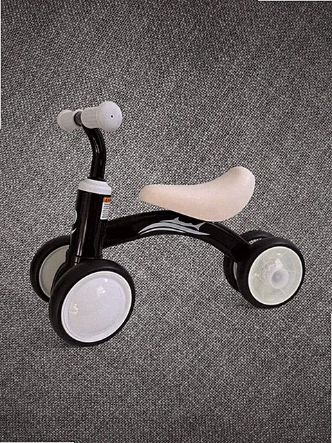 Kids Black And White Four Wheel Balance Bike With Light Up Wheels